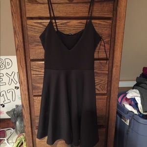 Strapped skater black dress