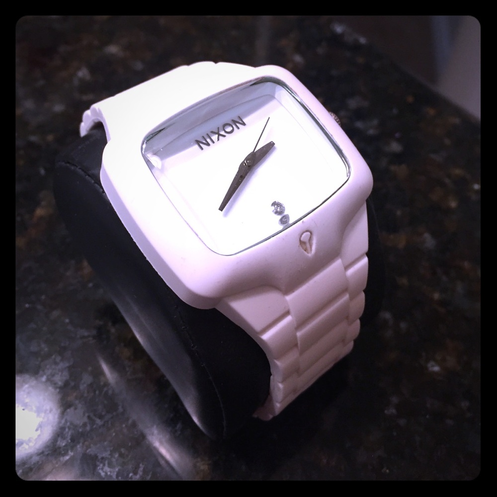Nixon watch , small diamond at 6"