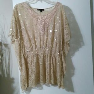 A lace butterfly wing blouse with gold sequence