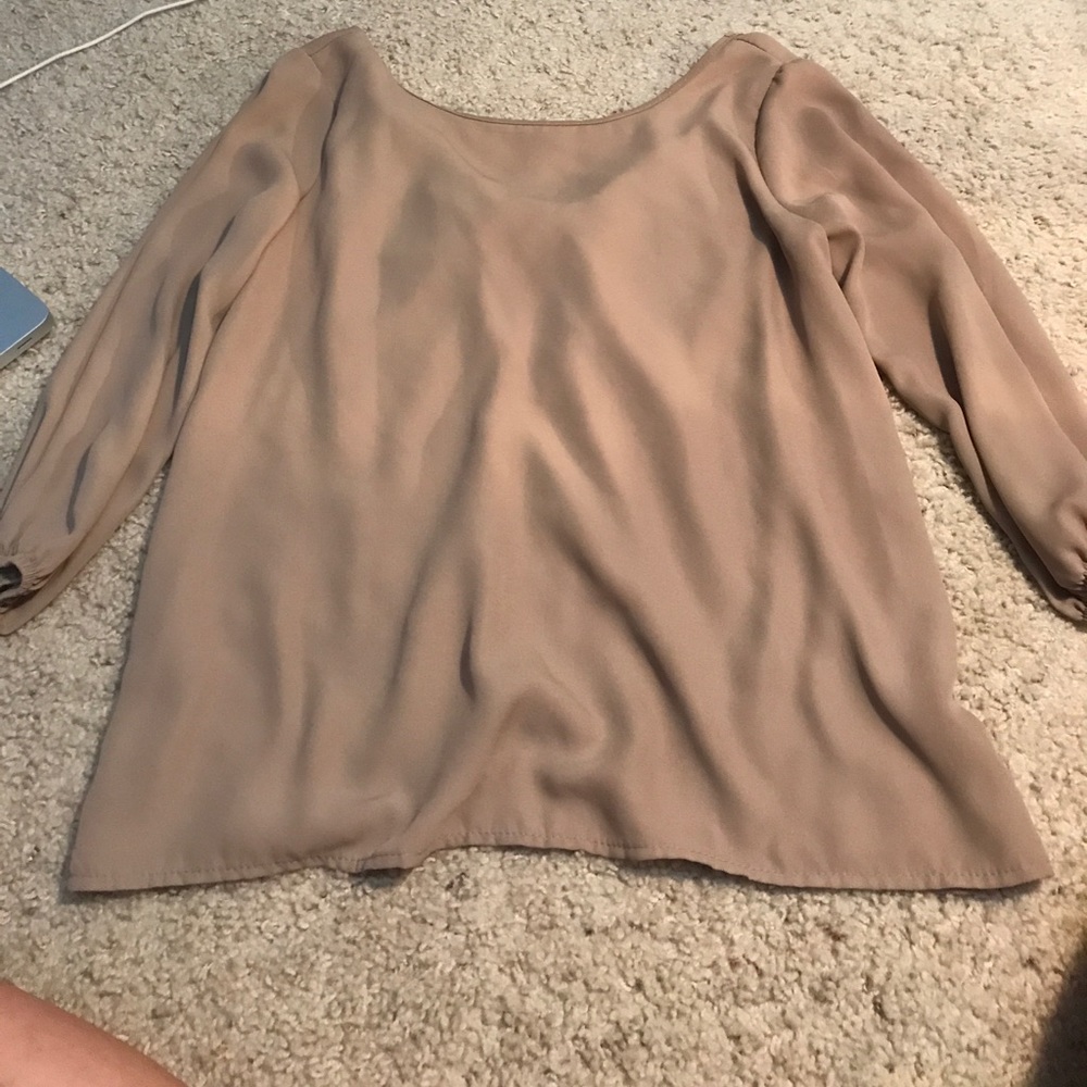 Cute top with bow on the back