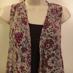 Lightweight sheer sleeveless duster. Size S/M.