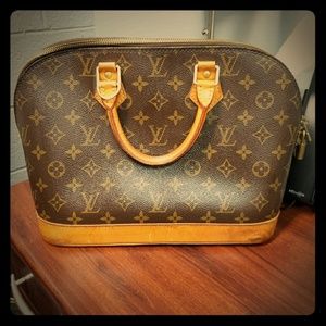 Genuine Lois Vuitton