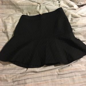 Black fit and flare mini skirt with gold zipper Black fit and flare mini skirt with gold zipper
