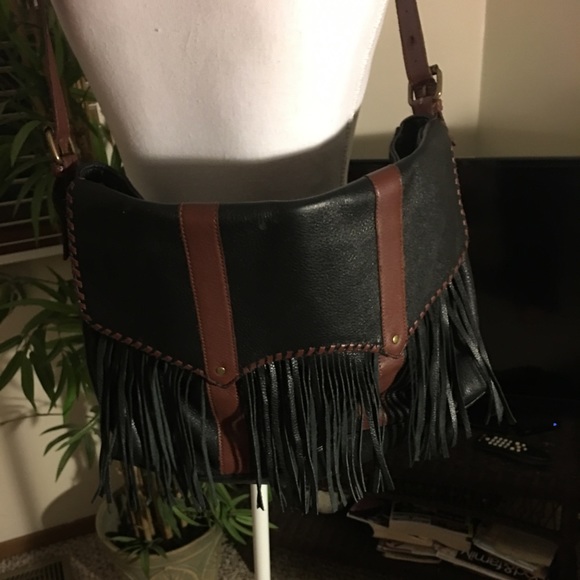 Muxo by Camila Alves Handbags - All leather handbag with fringe.