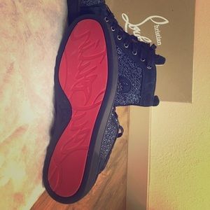Men's high top Christian Louboutin's.