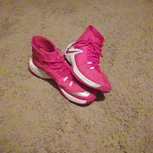 Salmon and white colored high-tops