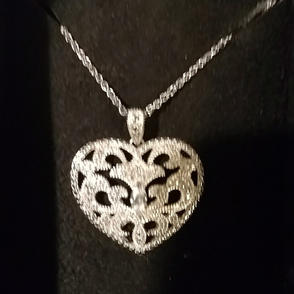 Sterling silver and CZ pendant🥂