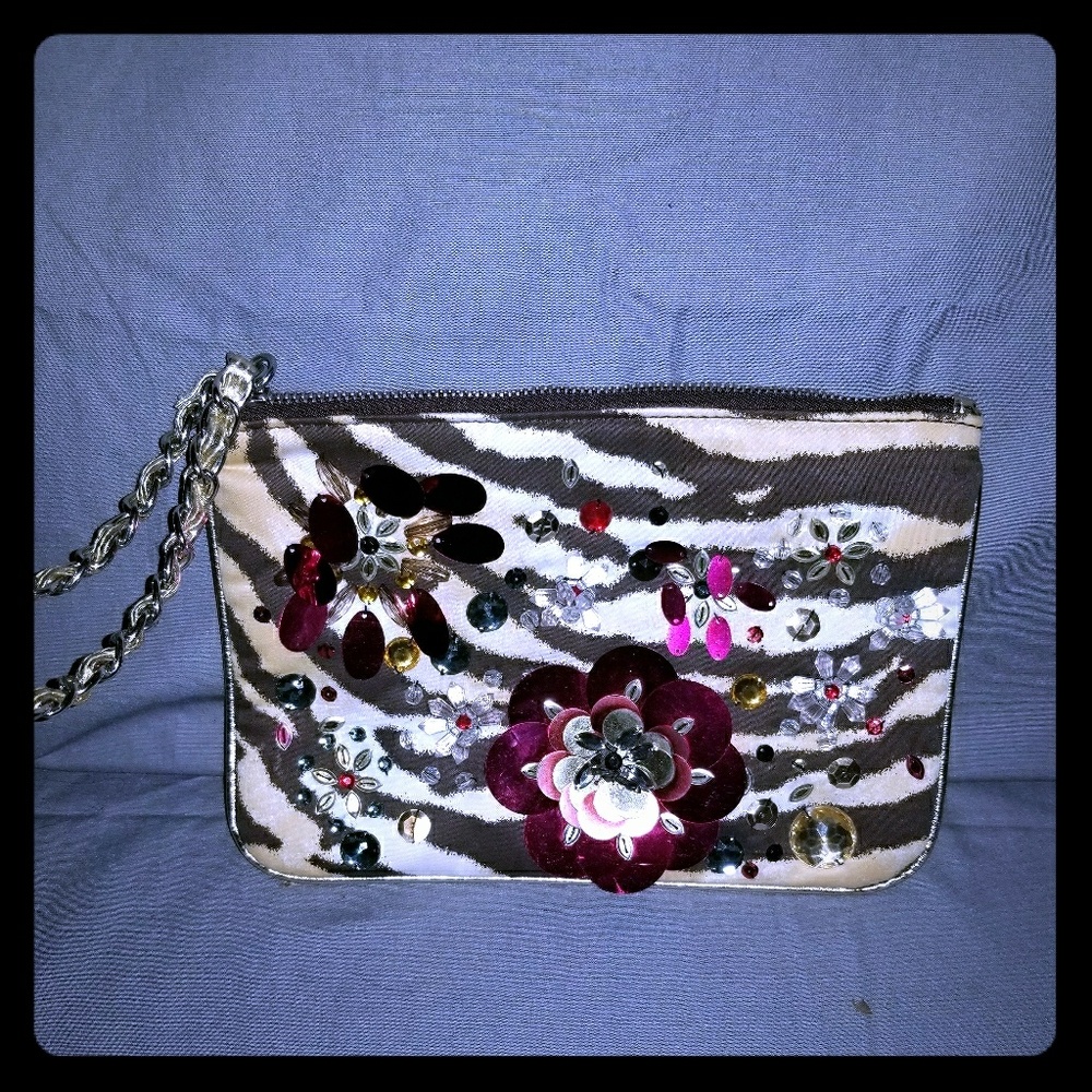 Express tiger print wristlet w/ embellishments