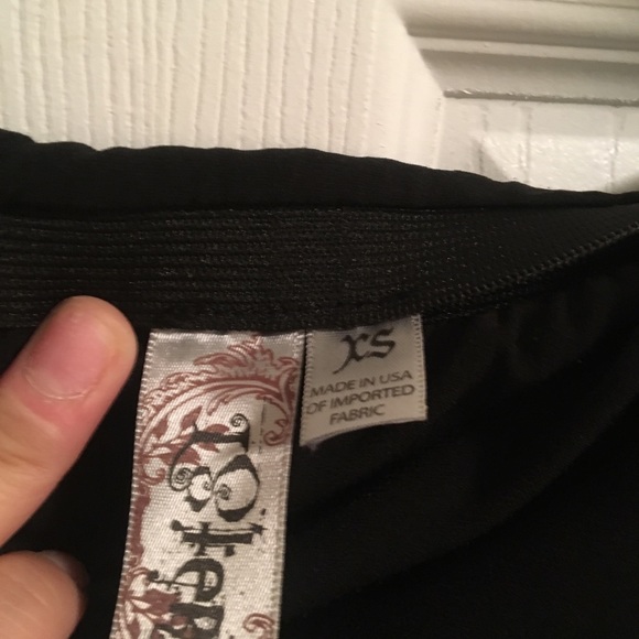 Strapless black romper with pockets - Picture 2 of 2