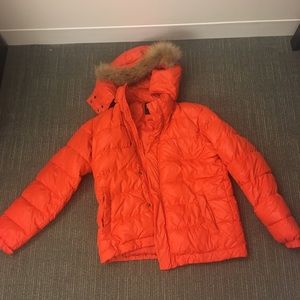 Orange puffy jacket