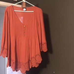 Venus-burnt orange button up top