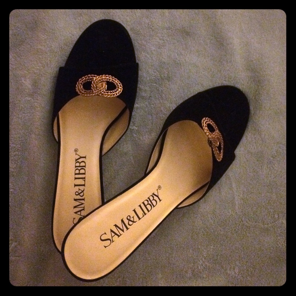 Black open toe sandals.