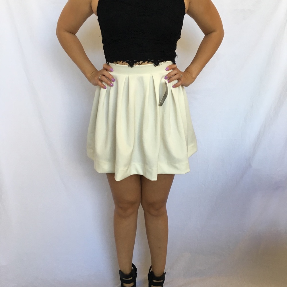 Cream mini flare skirt, NWT.