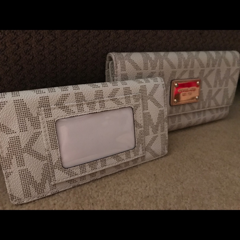 Michael Kors monogram wallet and checkbook cover