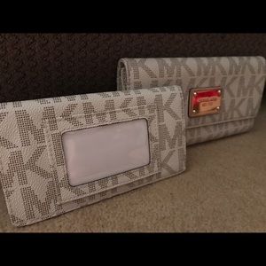 Michael Kors monogram wallet and checkbook cover