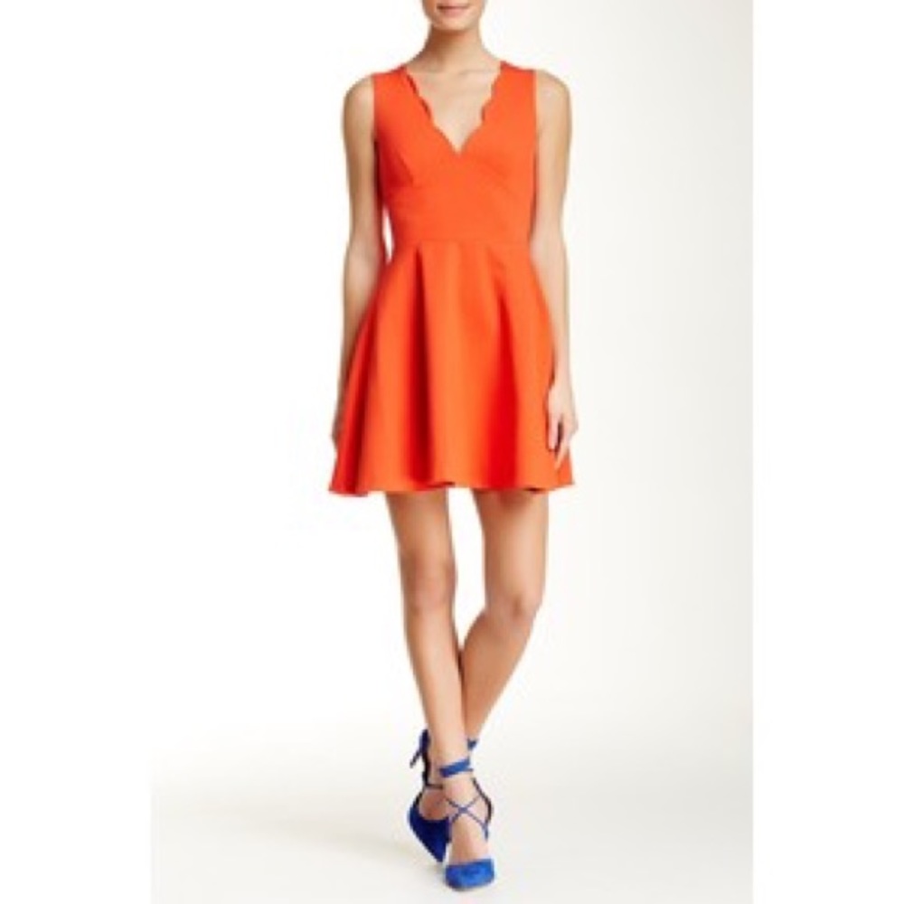 Tangerine dress with scalloped neckline