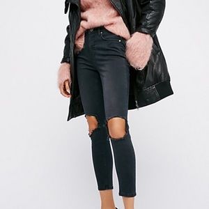 FREE PEOPLE busted knee skinny in washed black.