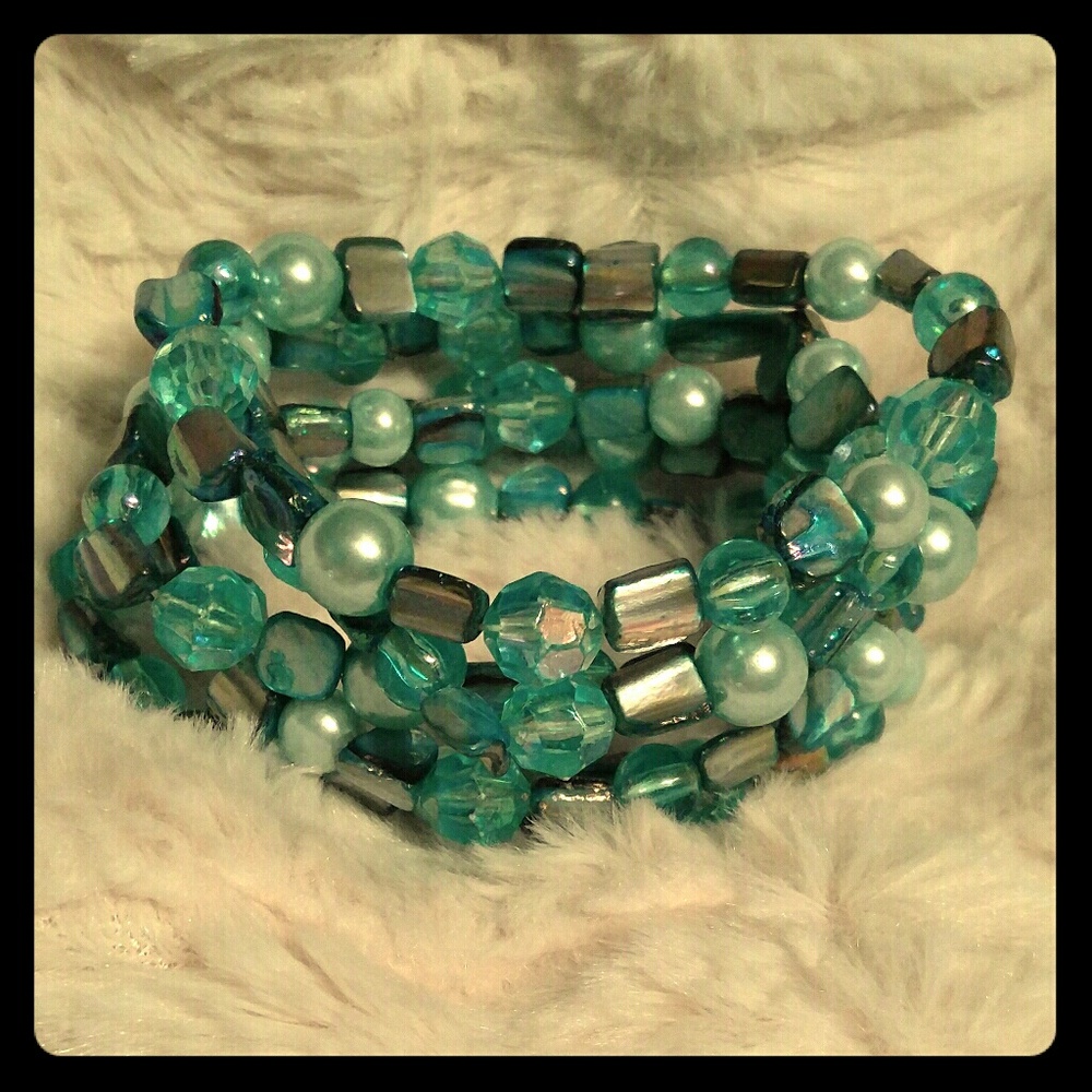 Multi strand turquoise colored bracelet.