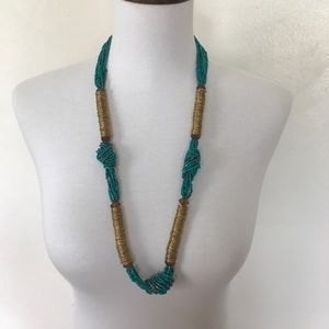 Turquoise and gold beaded knot statement necklace
