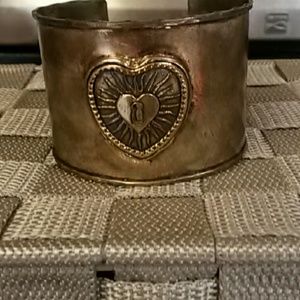 Waxing  poetic  cuff