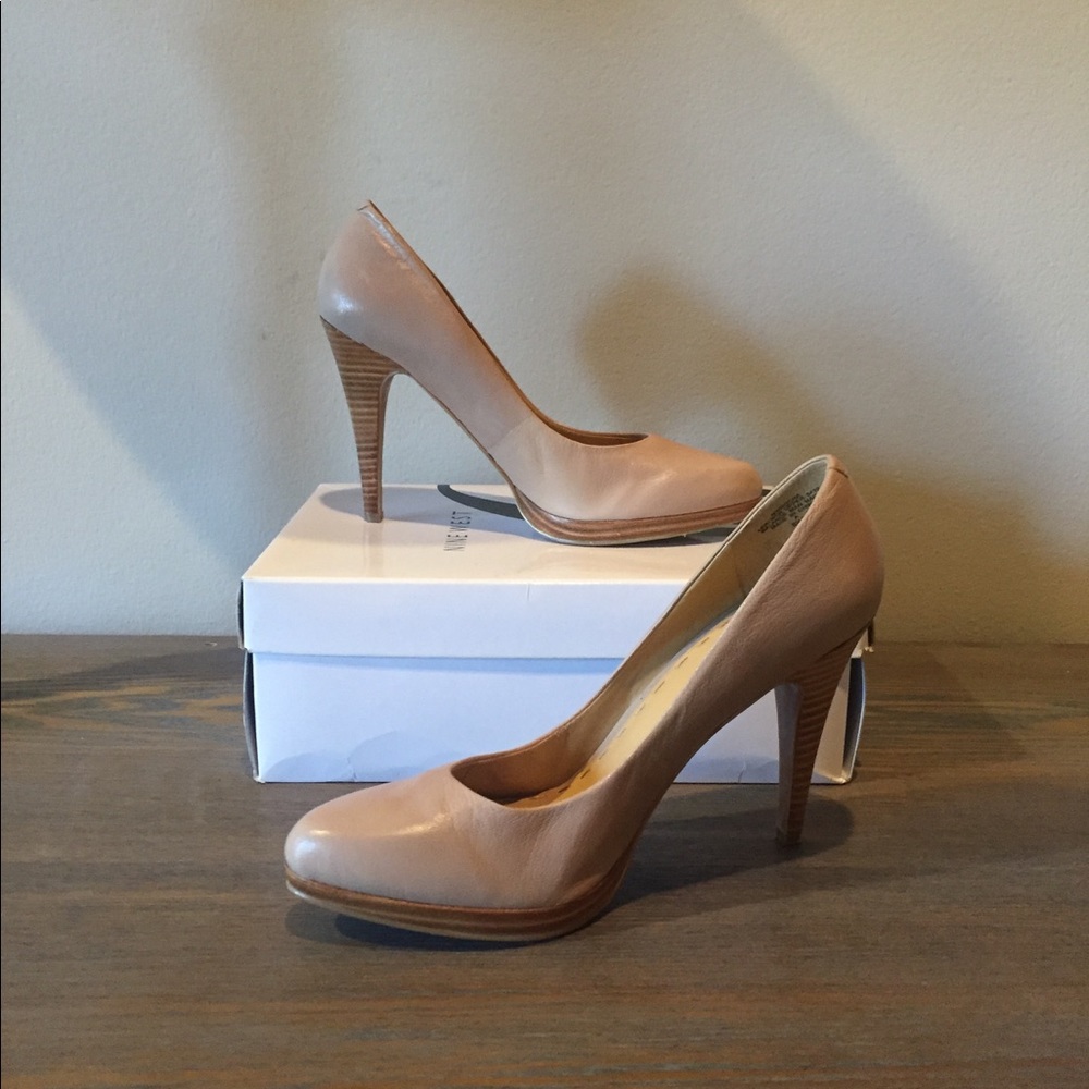 Never worn. Nine West nude pumps.