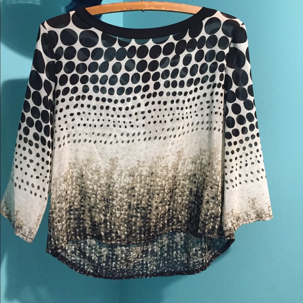 Formal top with unique black and cream print
