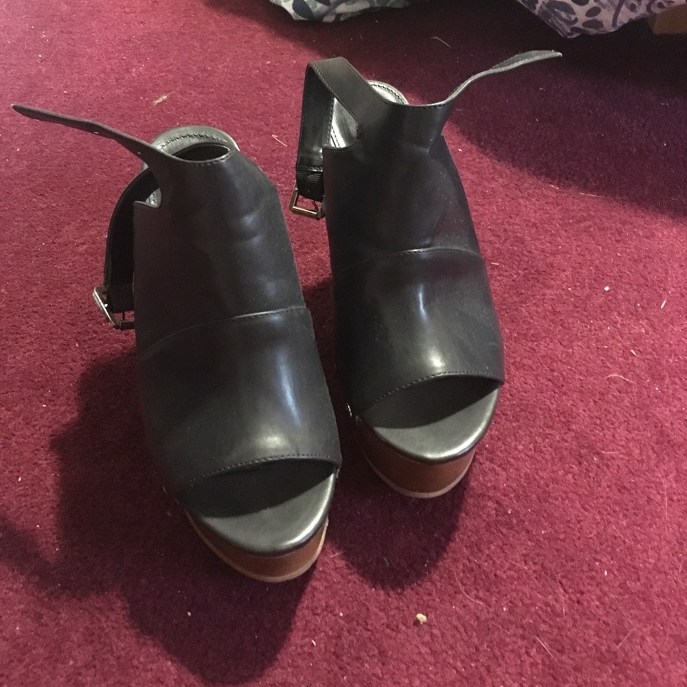 Black leather wedge shoes