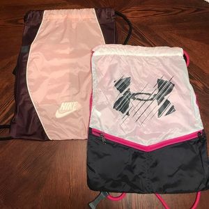 NIKE and UnderArmor drawstring bags.