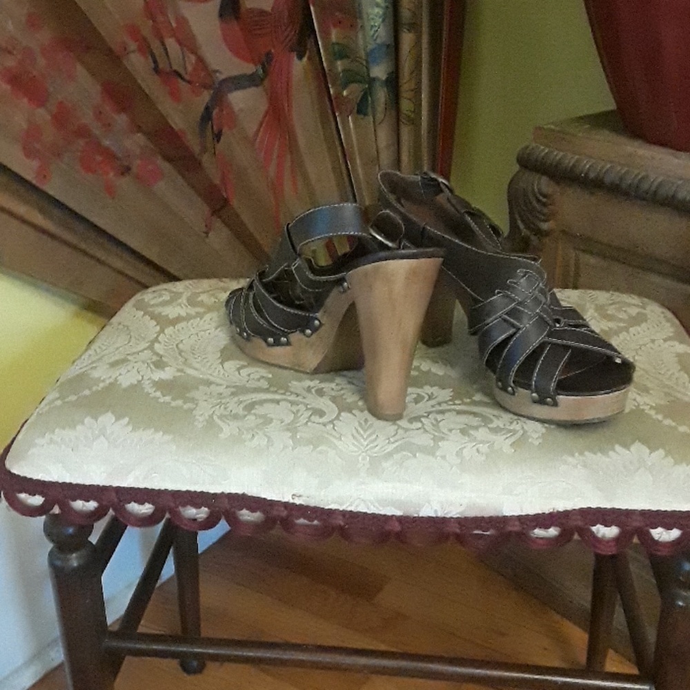A size 11  4 inch Brown  shoes