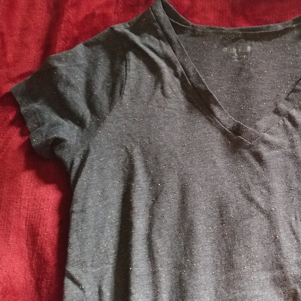 Dark grey, neon speckled V-neck