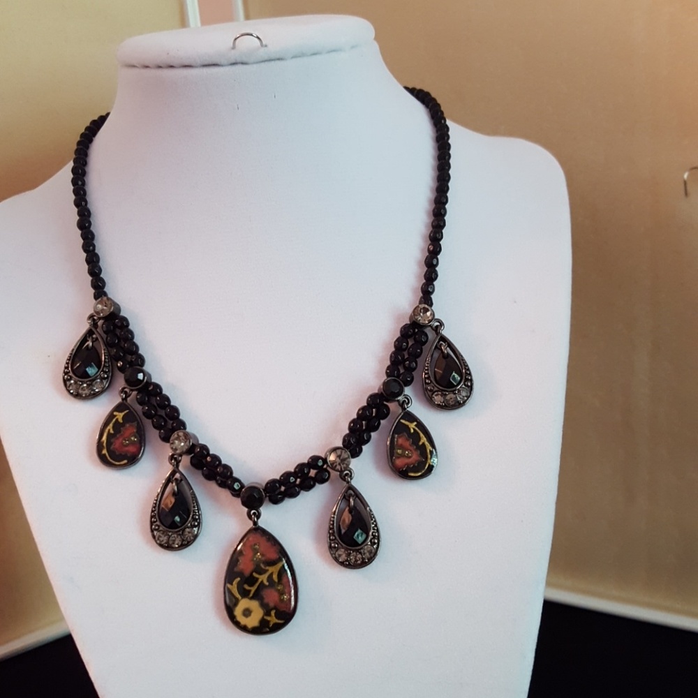 Black beaded necklace with designer pendants