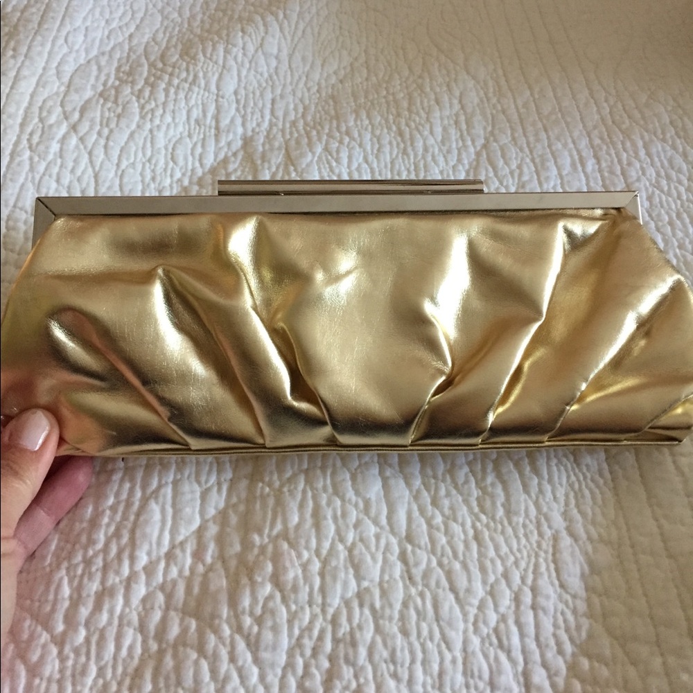 Gold clutch. Good condition.