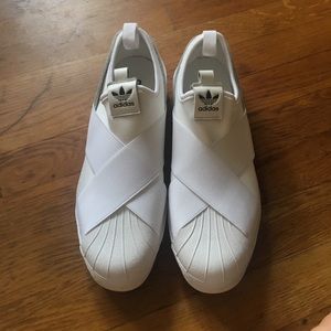 White Adidas Superstars