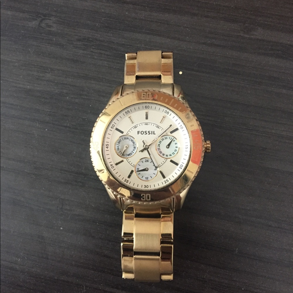 Gold fossil watch