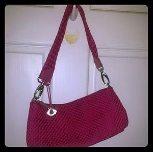 Fushia pink purse. The Sak