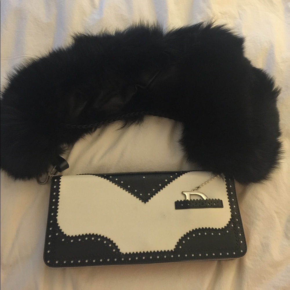 Authentic CD D’Trick Clutch w/ genuine fur shoulder strap.