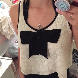 Cute small white tank top with a black bow