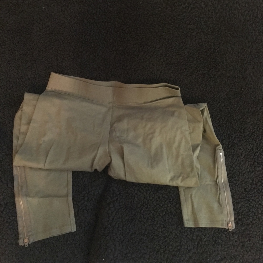 Army green zip up leggings.
