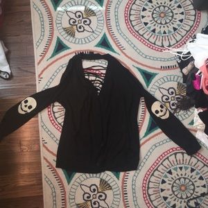 Black cardigan with white skull elbow patches