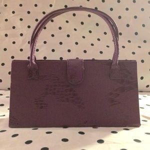 Purple “mock croc” triangular hand-held mini purse