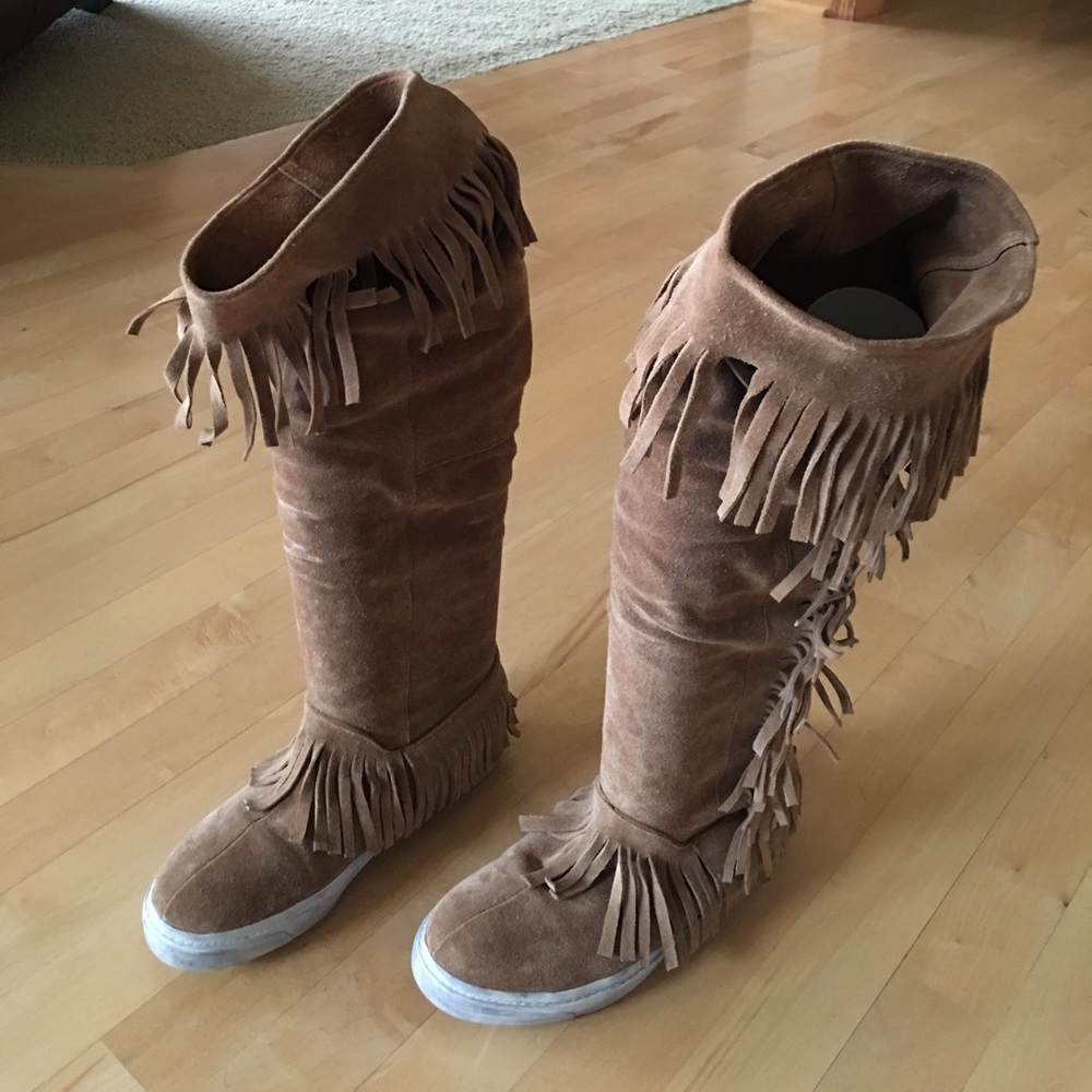 Knee high moccasin boots with rubber soles