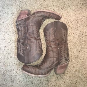Dark brown leather square toe cowboy boots.