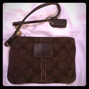 Brown Signature PVC coach wristlet