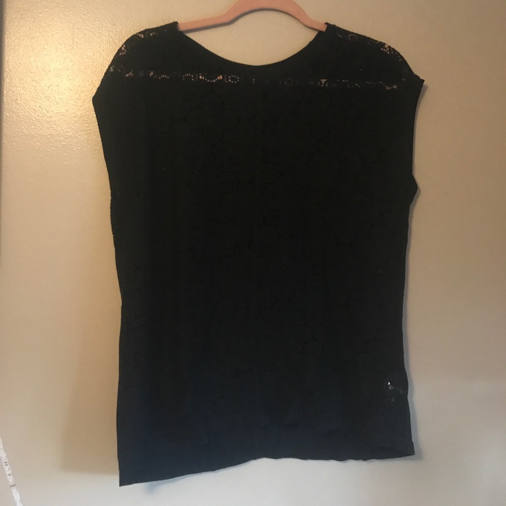 Black top with semi see-through lace on the front!