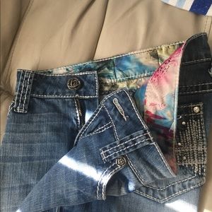 Boot cut jeans. Diamond studs w/stitch pattern