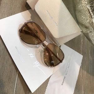 See the world through rose gold colored Sunglasses