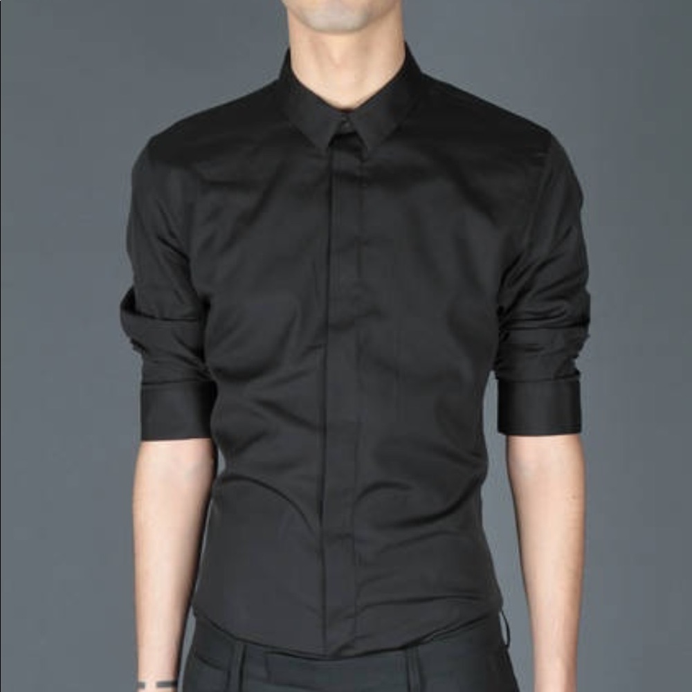 Kris Van Assche over shirt rolled up sleeves