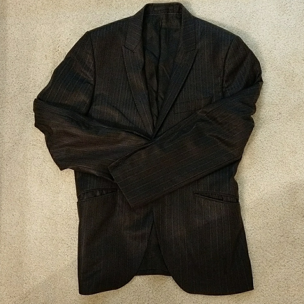 Single breasted, one button Holland Esquire