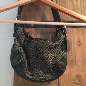 Black signature Coach small satchel.