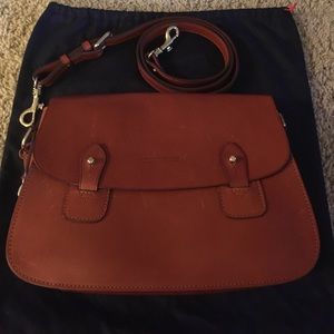 Dooney & Bourke double button flap purse.